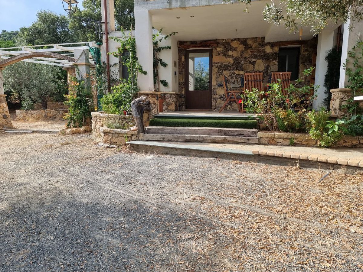 Traditional Sardinian dry-stone entrance of the Sa Medada farmhouse
